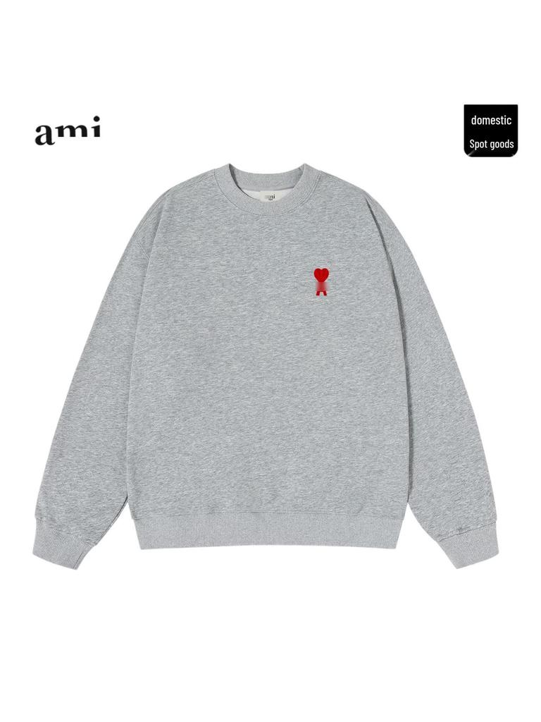 Unisex schwarzes Baumwoll-Rundhals-Sweatshirt mit Herzstickerei - Trendig und bequem für den Herbst.