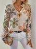 Women's Off-White V-Neck Knit Sweater with Blue Floral Pattern and Lace-Up Sleeve Detail