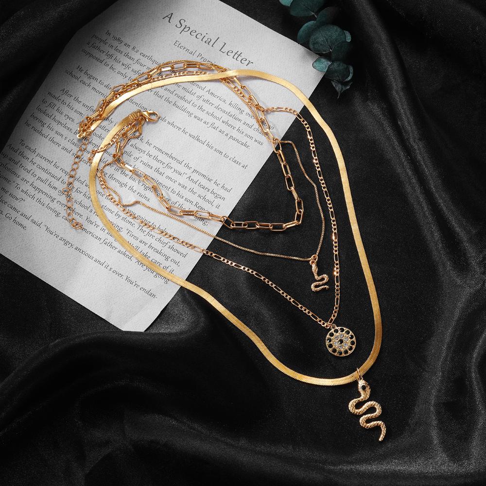Four Piece Snake Necklace Women's Fashion Hollow Out Necklace Personality Bohemian Sweater Chain Elegant Snake Pendant