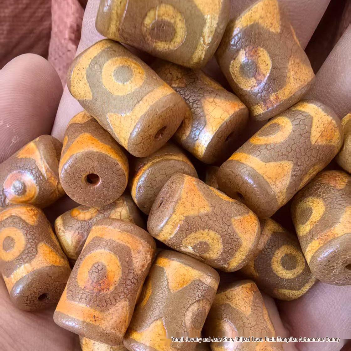 Natural Agate Tibetan Yellow Three-Eyed Dzi Beads (15×22mm) with Orange Peel Pattern. -