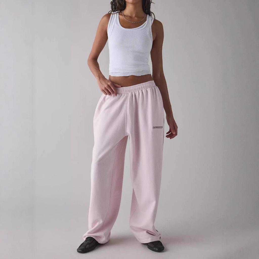 Pantaloni Sportivi da Donna Rosa Chiaro a Gamba Larga con Striscia Laterale e Vita Elastica