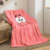 A simple pink background with a smiling cartoon face and wide eyes. for all seasons blanket lunch break throw gift