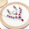 Gessen Jewelry: Elegant Red Zirconia Earrings, Ring & Pendant Set