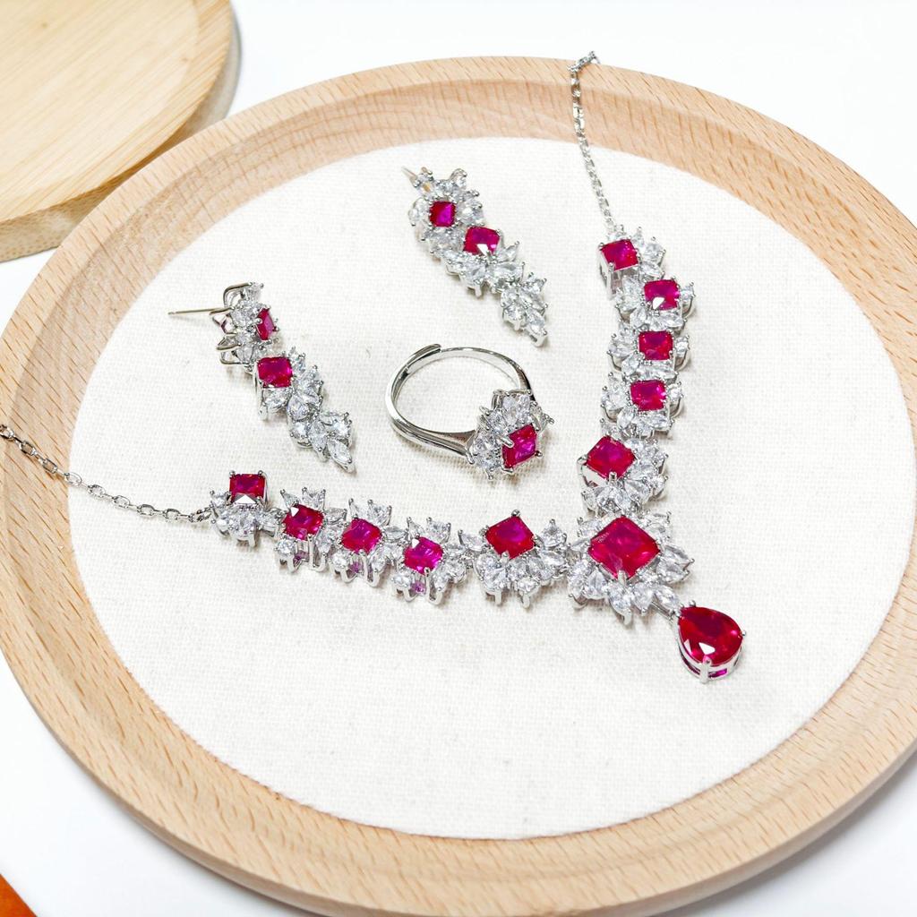 Gessen Jewelry: Elegant Red Zirconia Earrings, Ring & Pendant Set
