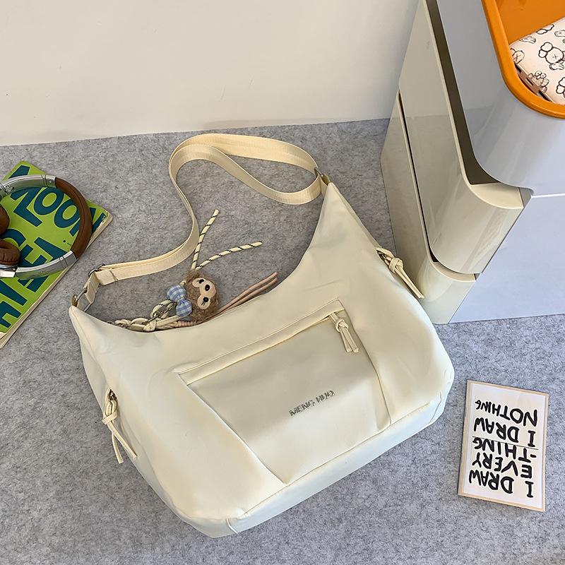 Korean version of messenger bag women's new simple large-capacity dumpling bag lightweight versatile satchel student shoulder bag tide