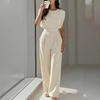Tuta Elegante Monocolore Girocollo Aderente in Vita Moda Europea e Americana Estate 2026