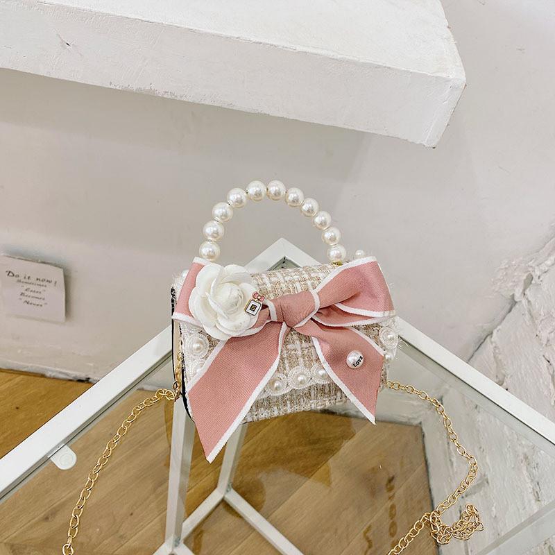 Stylish Mini Girls Handbag With Pearl Bow Design For Fashionable Princesses In Black And White Colors