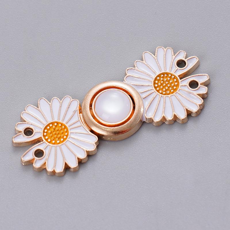 Removable, no-sew, no-nail waist button for jeans. Daisy waist button for slimming jeans.