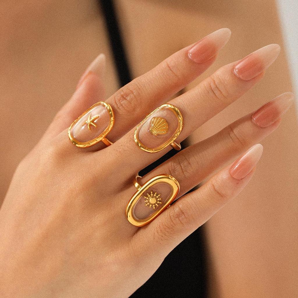 Starfish Epoxy Oval Ring: Adjustable Stainless Steel Finger Jewelry for Women In a Simple, Stylish Design.