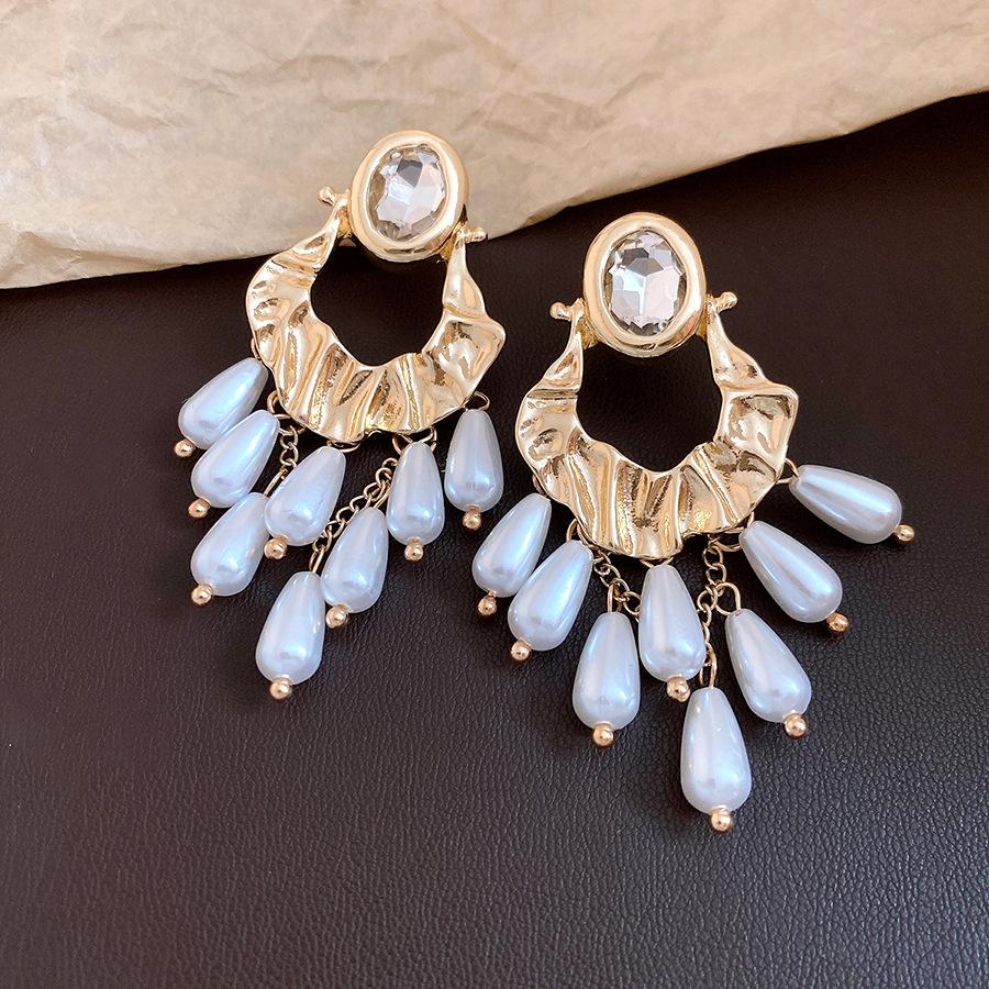 Retro silver needle diamond-encrusted oval pearl fringed earrings light luxury high-end stud earrings fashionable and exquisite earrings