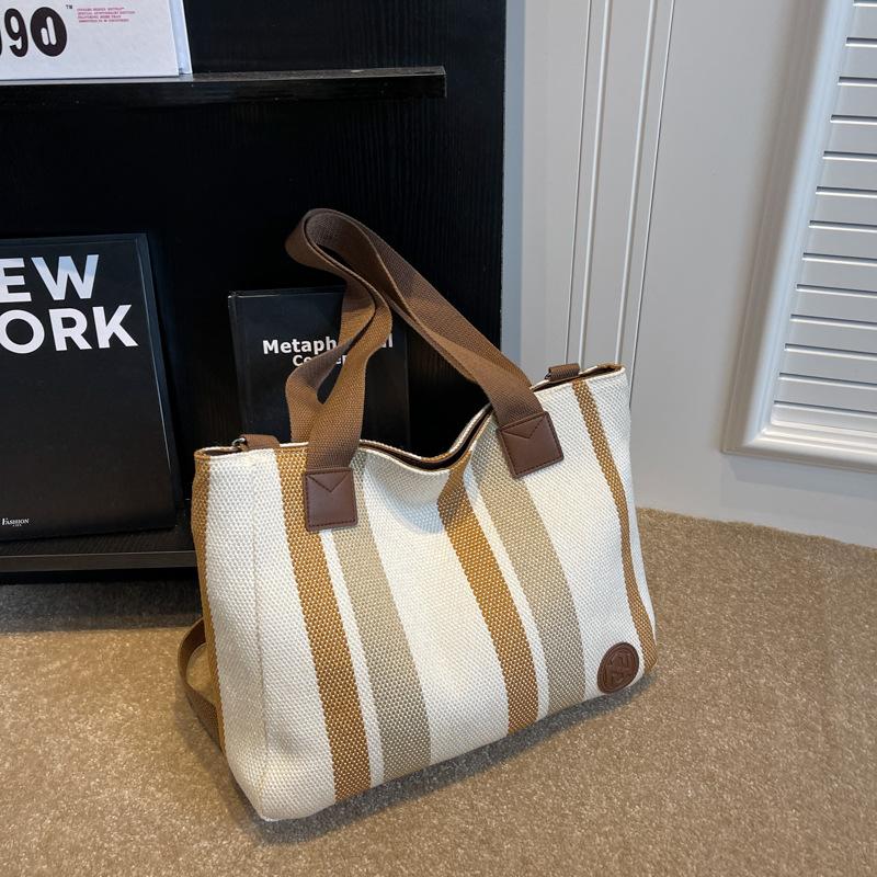 Korean version of large-capacity women's shoulder bag women's 2025 new simple vertical striped casual tote bag fashion handbag