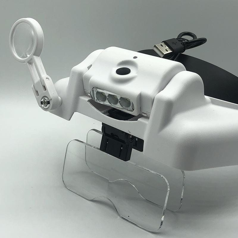 

Налобна лупа з 3 світлодіодами та кількома збільшеннями, заряджання через USB білий