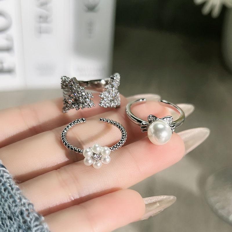Sweet kitten pearl flower fashion open ring female Korean simple niche design sense exquisite fashion ring