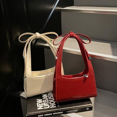 Süße Schleife Achseltasche Damenhandtasche neue einfache tragbare kleine quadratische Tasche vielseitige Umhängetasche