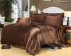Red Wedding Four-Piece Set: Imitation Mulberry Silk Duvet Cover and Bed Sheet in Solid Color, Double Size, Faux Tencel Tribute Satin.