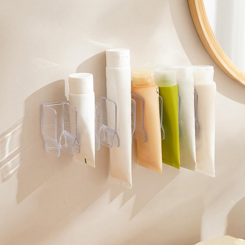 Wandmontierter, nicht perforierter Toiletten-Aufbewahrungsständer für Gesichtsreiniger, Kosmetikständer, Spiegelschrank, Zahnpasta-Abflusshalter