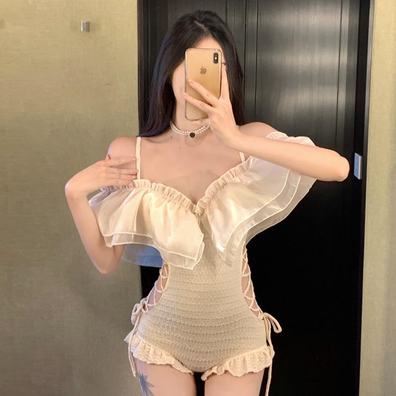 1011 new girls hollow one-piece swimsuit women's small breast steel support gathers conservative to cover the meat and look thin hot spring swimsuit