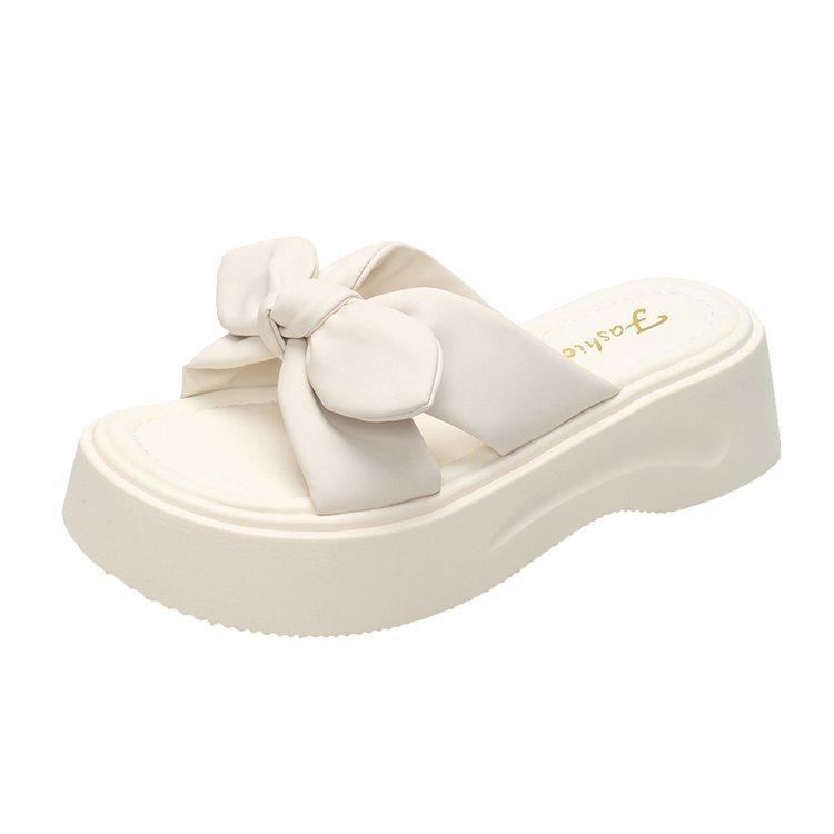 

Новые универсальные шлепанцы на платформе женские летние носить бант однословные тапочки для увеличения роста модные милые сказочные тапочки 40