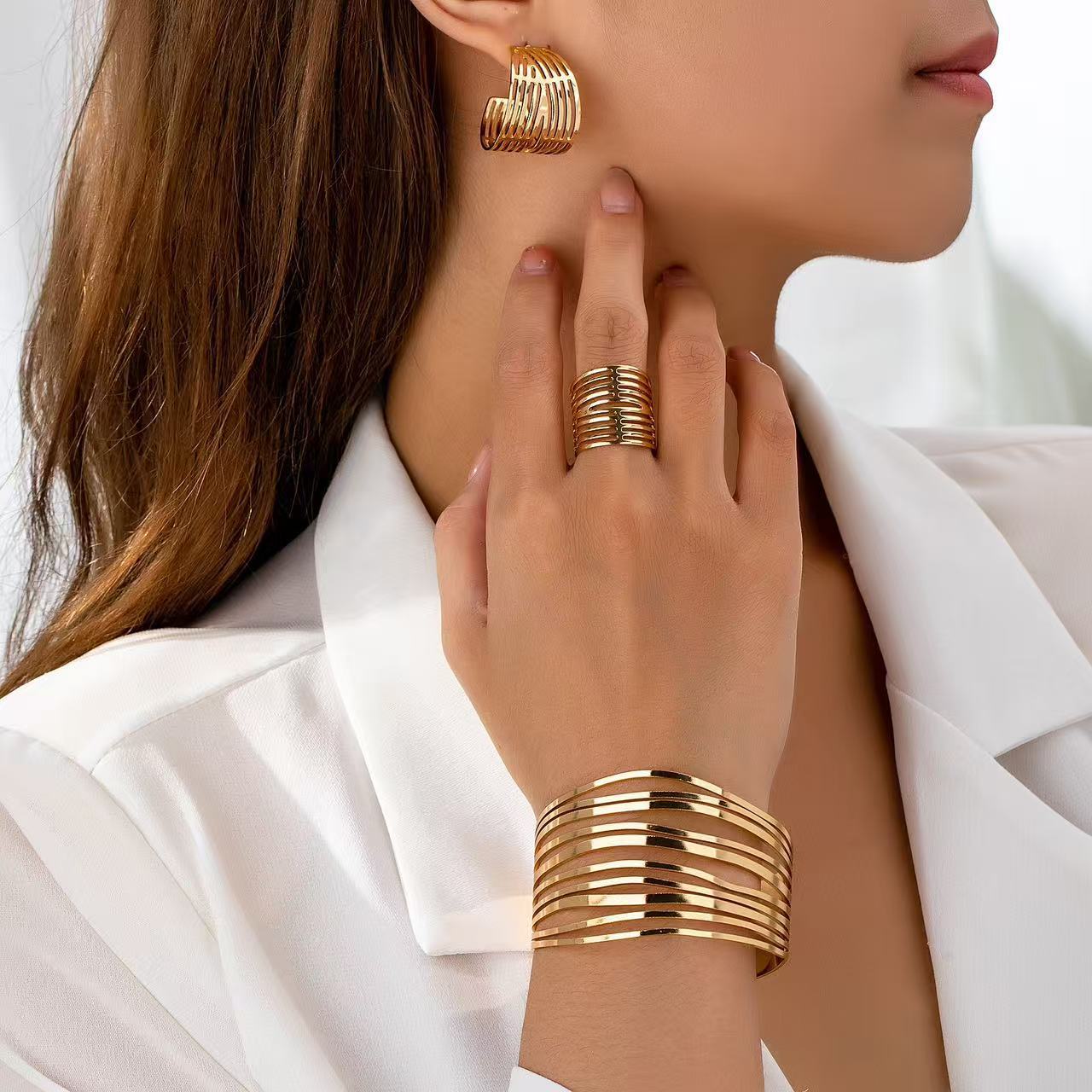 

Geometric lines personalized fashion hollow ring earrings bracelet set