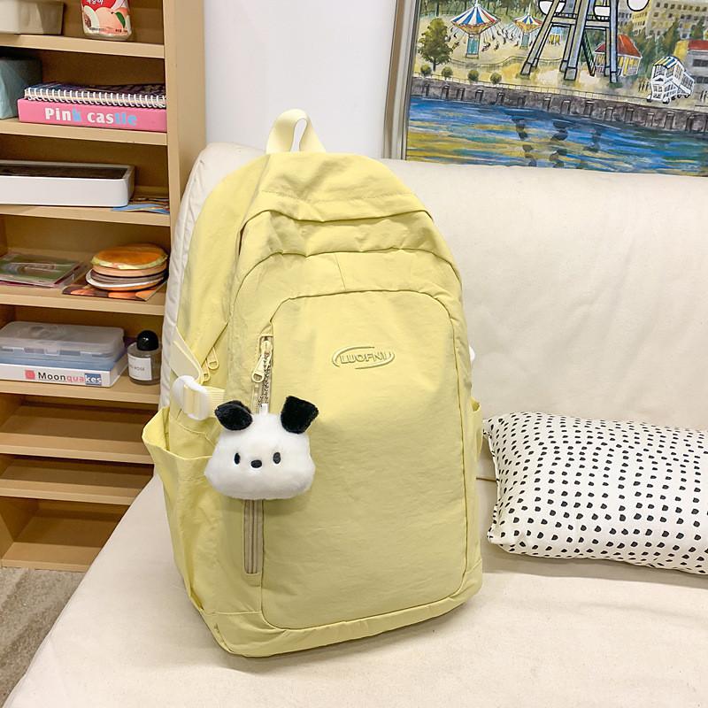 

Simple Solid Color Letter Embroidery Student Backpack With Plush Pendant For Middle School Students жёлтый
