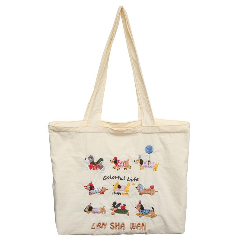 

2025 new versatile large-capacity cute cartoon handbag fashionable, lightweight and simple college student commuting shoulder bag білий