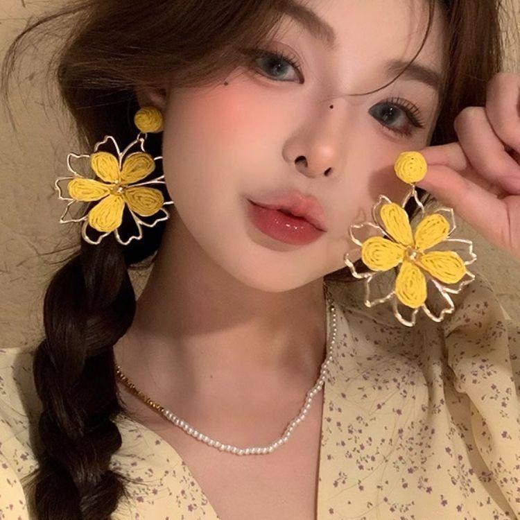 

Holiday wind woven sun flower earrings women s high-end earrings exaggerated seaside beautiful stud earrings