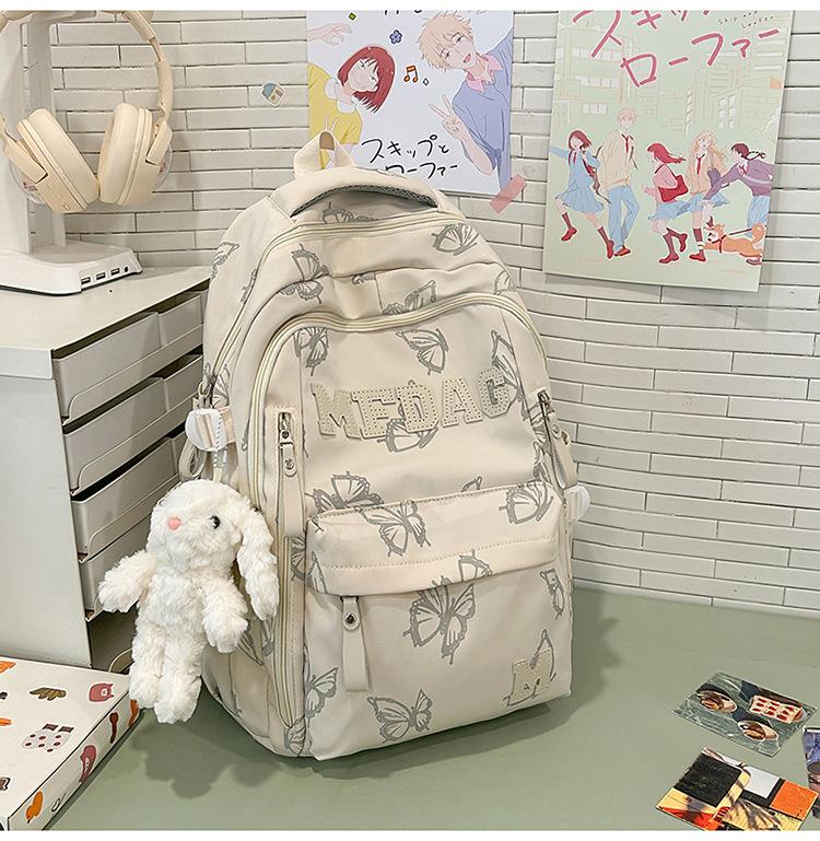 Schoolbag Soft light Cool atmosphere Milk white butterfly full print schoolbag Junior high school students Daily commute Lightweight versatile