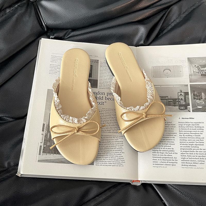 Flat-bottomed one-word tow shoes female French bow exquisite fairy style 2025 summer outer wear new non-slip cool slippers