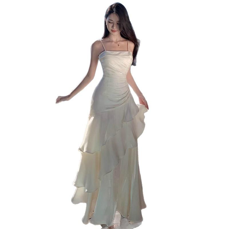 Niche light luxury suspender dress for women's new seaside vacation ruffle leaf edge temperament high-end fishtail dress