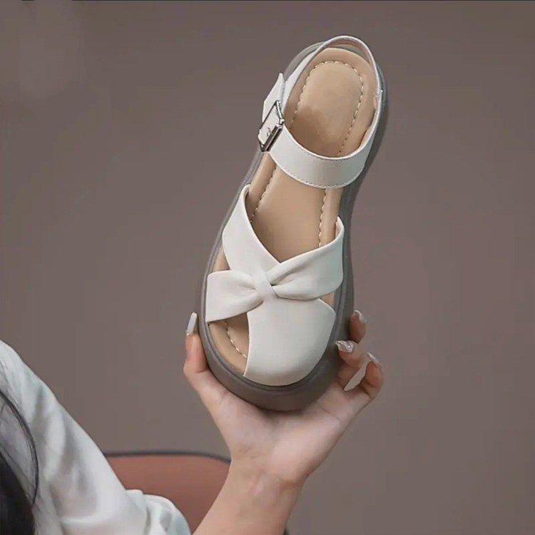 

Versatile casual sandals women s 2025 summer new Versatile outer wear one-word buckle hollow hole shoes breathable Roman sandals 40