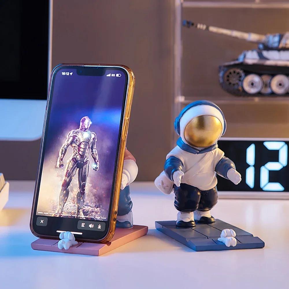 Künstlerische Astronauten-Ornamente Büro-Schreibtischdekoration Astronauten-Halter Handy-Ständer Halter Spielzeug Geschenk Schlafzimmerdekoration