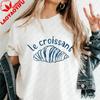 Damen Minimalist Le Croissant T-Shirt Französisch Blau Linienkunst Grafik-T-Shirt Baumwoll-T-Shirt Sommer Ästhetik Pariser Essensliebhaber Oberteile