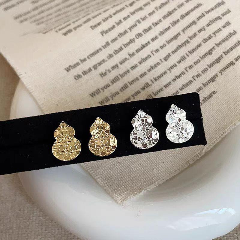 

Crushed ice ice golden gourd stud earrings retro earrings niche design temperament high-end earrings women золотой