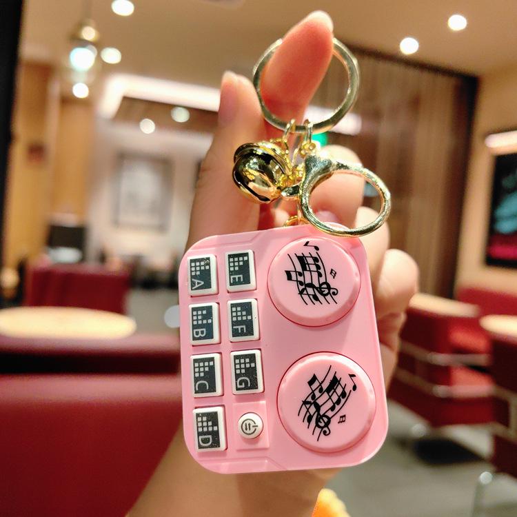 Leuchtender Mini-DJ-Mixer Schlüsselanhänger: Cartoon Musik-Spielkonsolen-Anhänger