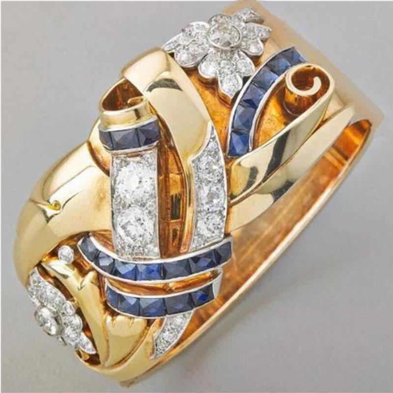 Bague Florale Vintage en Laiton et Zircon: Design Rétro Audacieux avec Large Bande Creuse pour un Style Européen et Américain Unique.