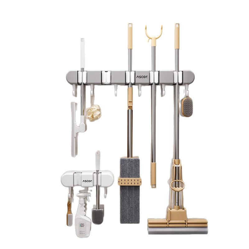 Wieszak ścienny na miotłę i mop: Rozwiązanie do zawieszania bez wiercenia na drzwiach łazienkowych lub toaletowych.