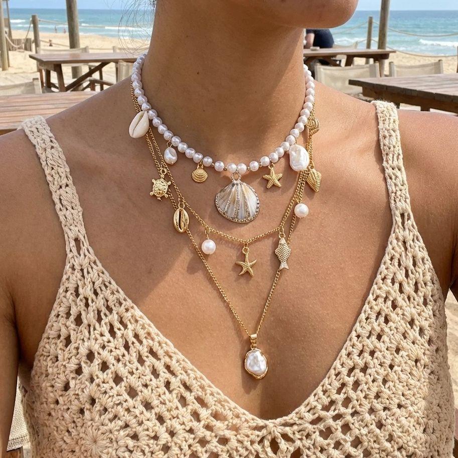 Bohemian Handgefertigter Seestern Sonne Anhänger Halskette für Damen Sommer Muschel Imitation Perle Reiskorn Perlen Choker Strandurlaub Schmuck