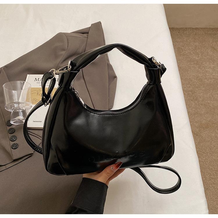 

Premium sense light luxury small bag women 2025 new fashion personality niche design one shoulder crossbody portable dumpling bag чёрный