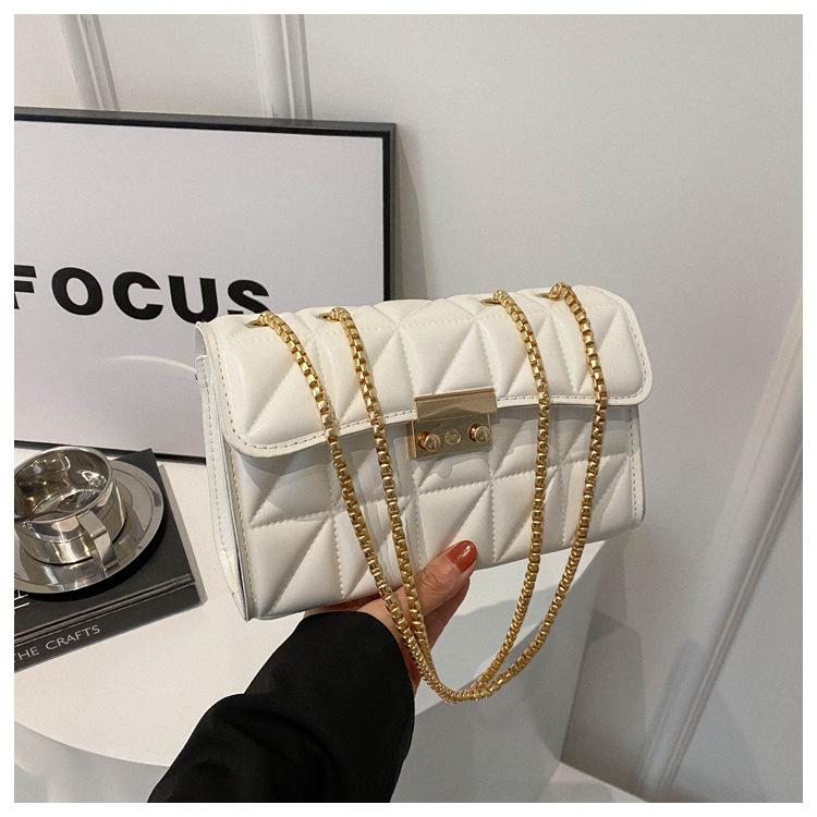 

Lock temperament simple solid color chain underarm bag small bag women s 2024 spring new versatile Korean version messenger bag білий