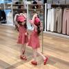 2024 Summer Girls' Sweet A-Line Plaid Suspender Skirt - White/Red with Lace-Up Detail
