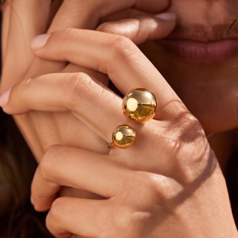 Stainless steel smooth surface small gold ball ring female simple size bead arc hollow ball direct supply