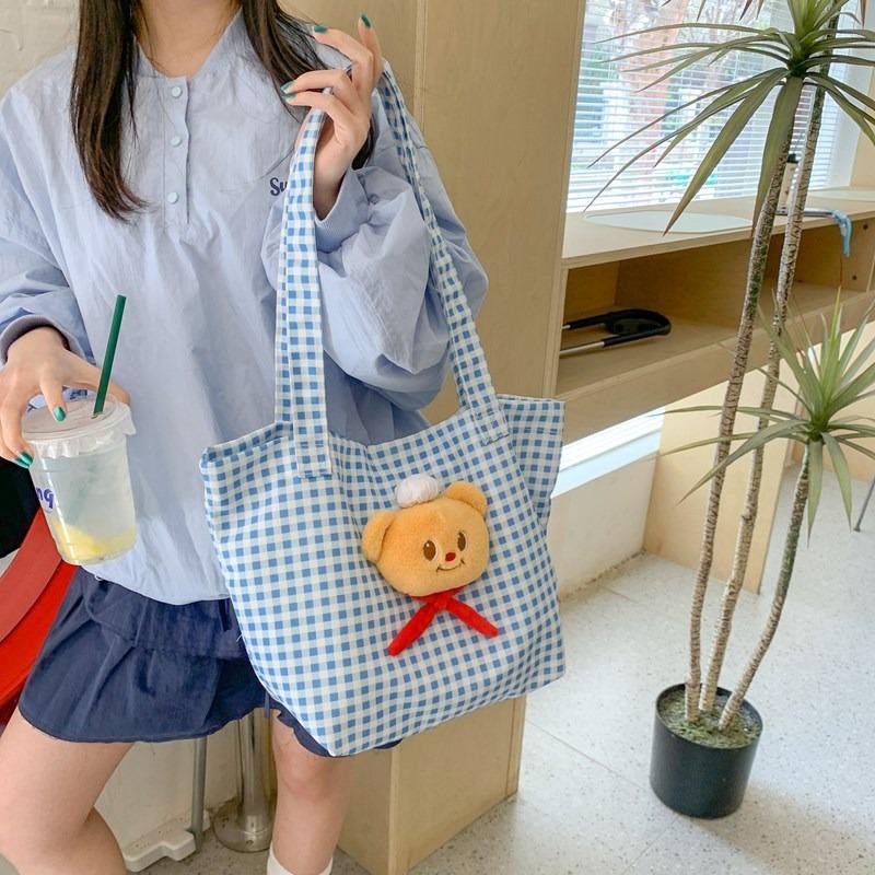 Cute bear backpack, new blue plaid shoulder tote bag, large-capacity casual commuter canvas backpack.