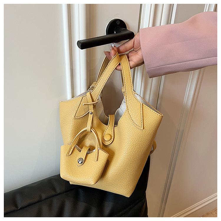 

Niche casual bucket bag new fashion spring and summer mother bag soft leather temperament shoulder women s bag жёлтый