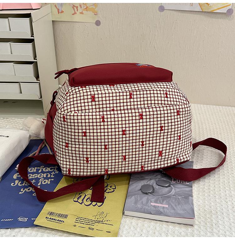 Słodki plecak w stylu japońskim z kokardą: Lekka, wodoodporna torba na ramię dla uczniów szkół średnich i ponadgimnazjalnych.