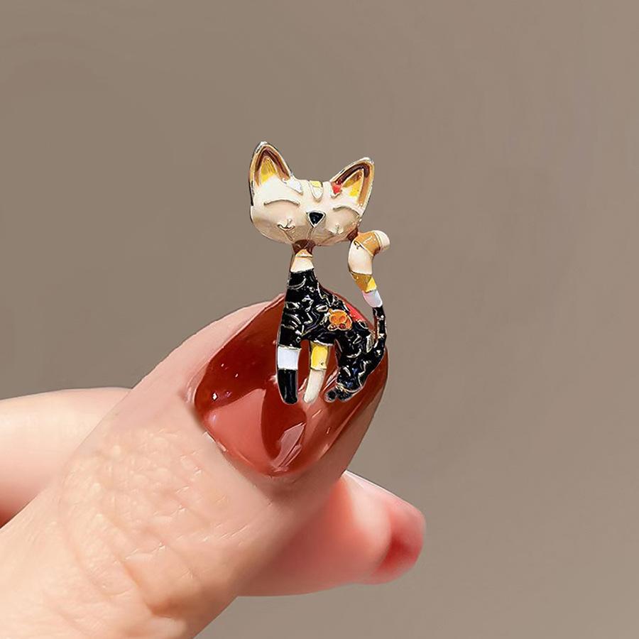 

Ретро черная брошь-котенок, нишевая булавка высокого класса, женственный темперамент высокого класса, аксессуары для воротника, дизайн корсажа