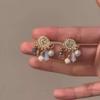 Exotic high-end fringed earrings, niche retro ethnic style earrings, French heavy industry bohemian earrings.