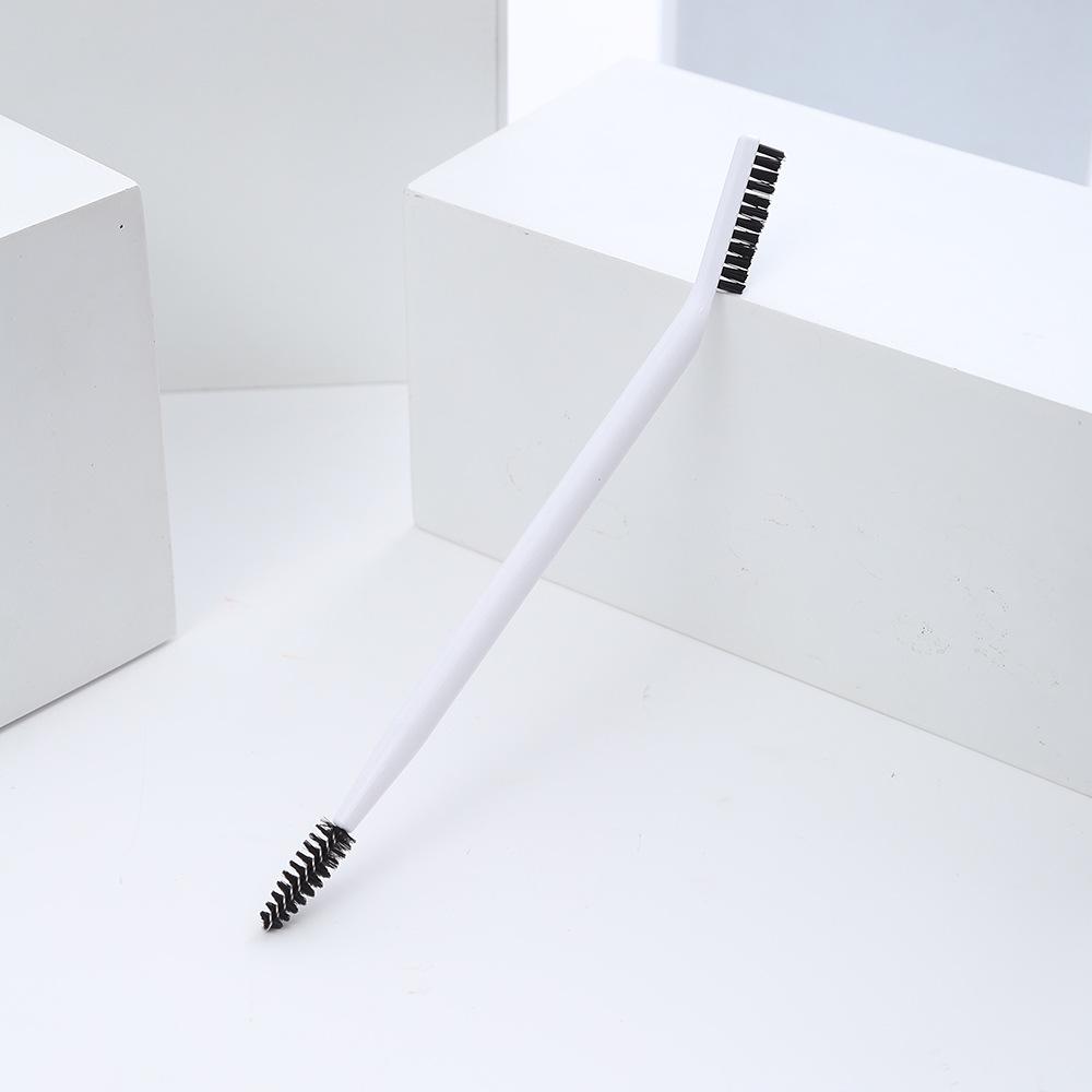 Portable Dual-Head Eyebrow & Eyelash Brush: Comb & Curl with One Tool for Effortless Beauty.