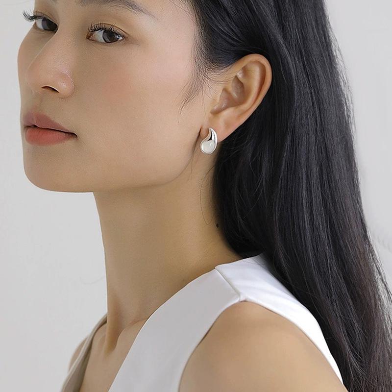 2025 Trendy Teardrop Earrings: Women's Fashion Studs with Inlaid Natural Crystals