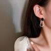 Gold Coil S925 Silver Needle Stud Earrings: French Retro Light Luxury Fashion, High-End Niche Accessories.