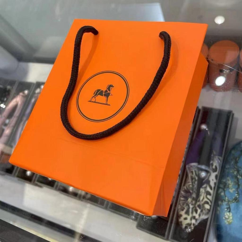 Exquisitely Decorated Orange Round Gift Box with Ribbon Neckerchief